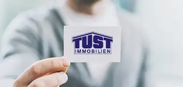 Tust Immobilien Visitenkarte